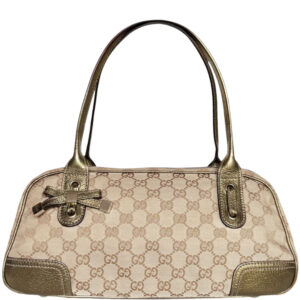 Vintage Gucci Monogram Bow Shoulder Bag in Beige / Metallic / Gold | NITRYL