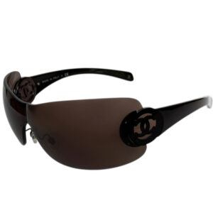 Vintage Vintage Chanel Logo Rimless Wraparound Sunglasses in Brown | NITRYL