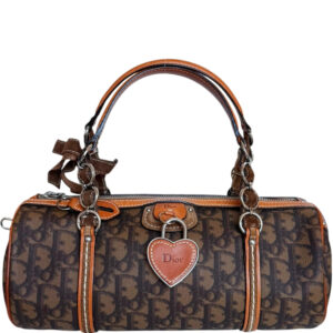 Vintage Dior Monogram Heart Lock Romantic Barrel bag in Brown / Tan | NITRYL