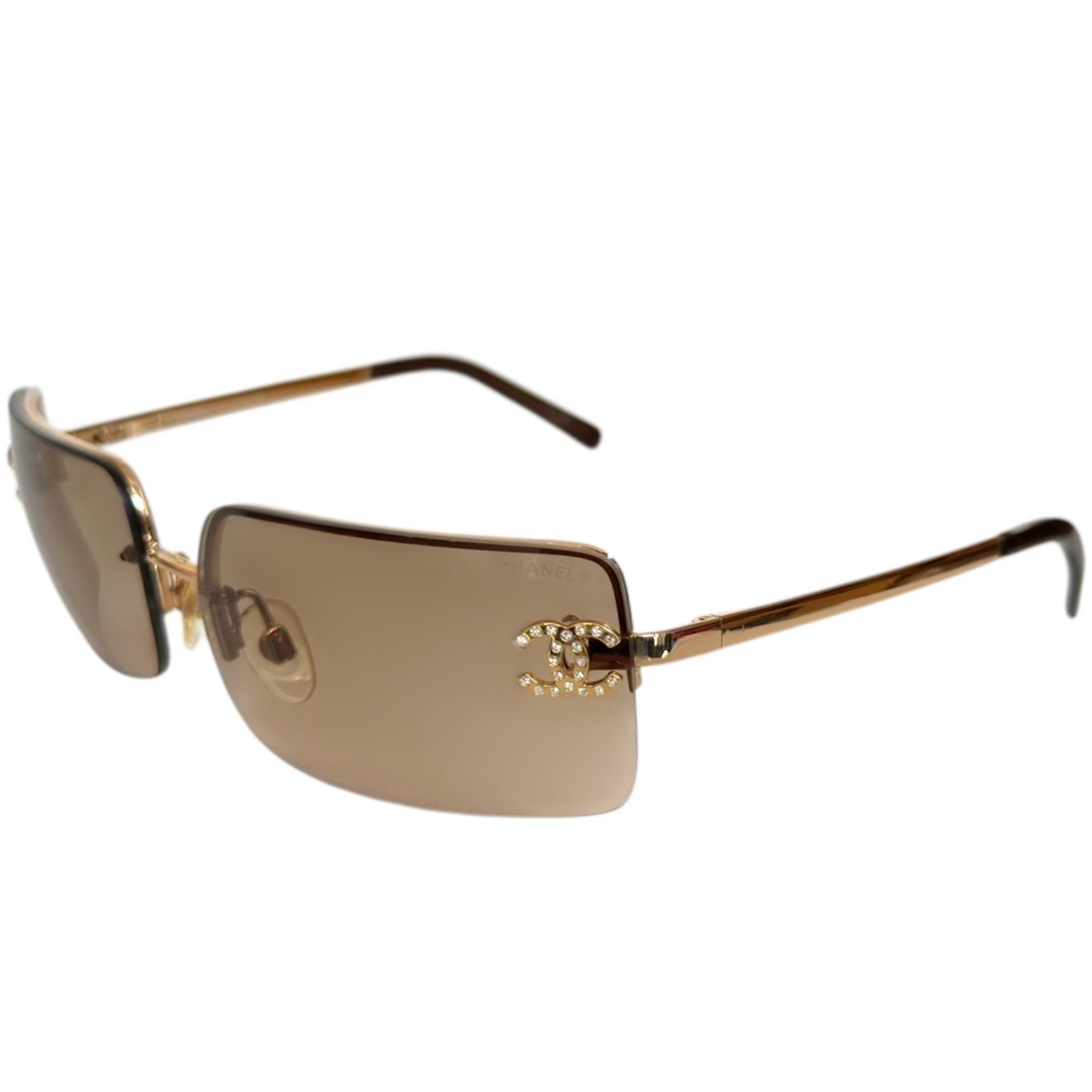 Vintage Chanel Diamante Logo Rimless Sunglasses in Brown / Gold | NITRYL