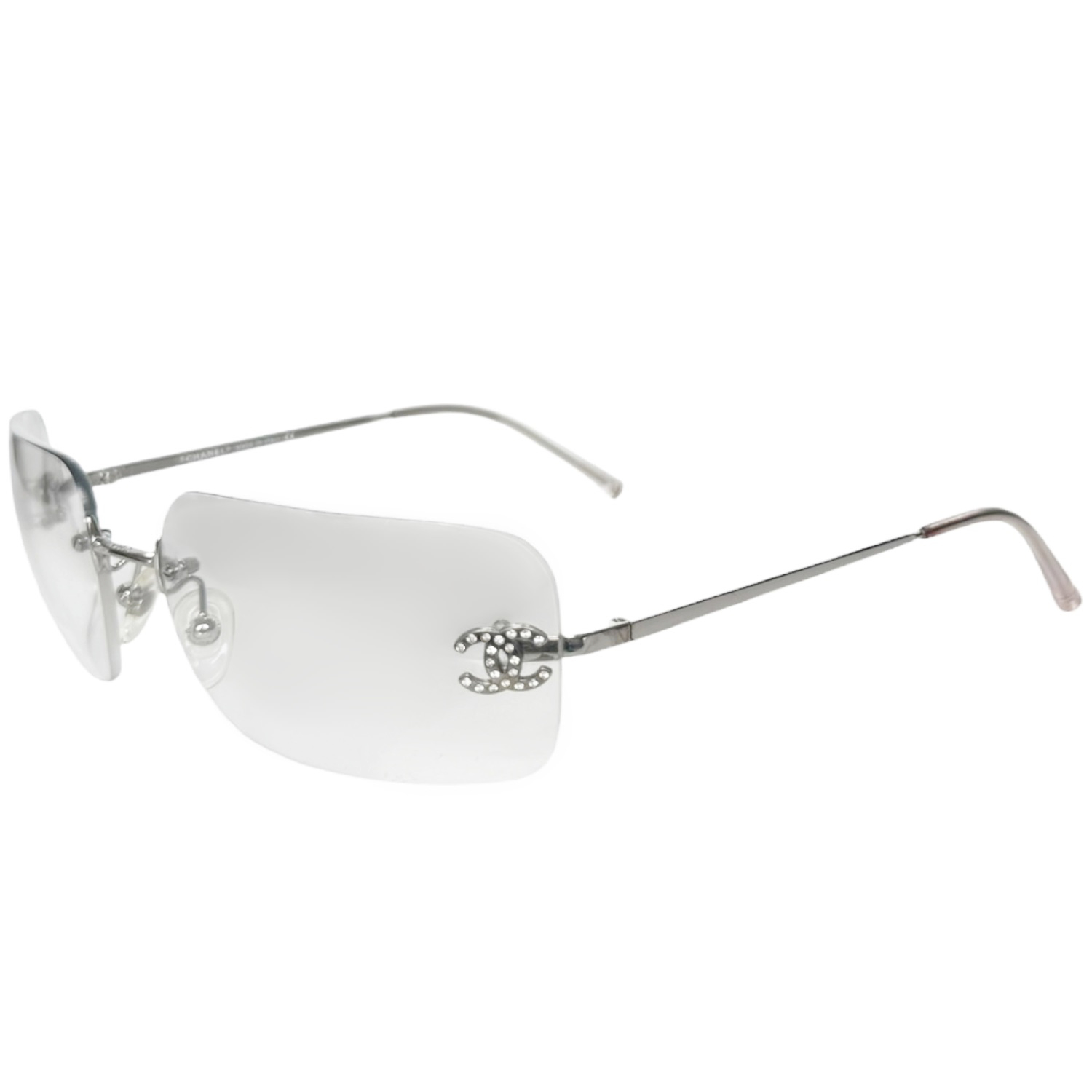 Vintage Chanel Diamante Logo Rimless Sunglasses in Silver | NITRYL